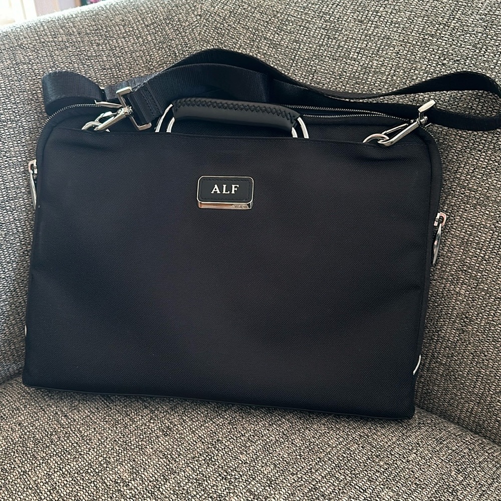 Tumi Slim Brief with padded compartment - Black with Black Leather